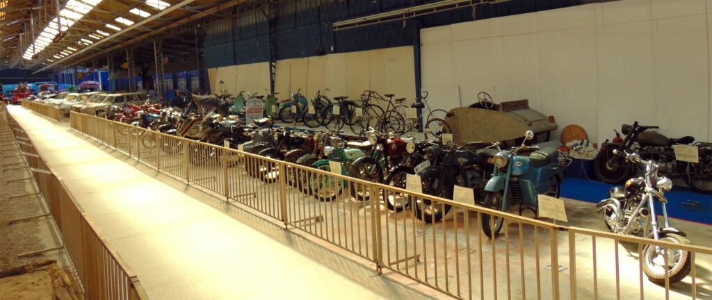 Motorcycles, mopeds and bicycles in Car museum Reims